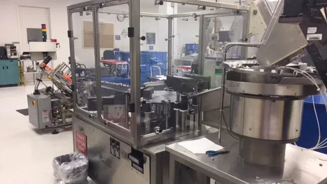 Combination fill-finish machine in a medical device cleanroom, the kind of capital equipment a User Requirements Specification defines