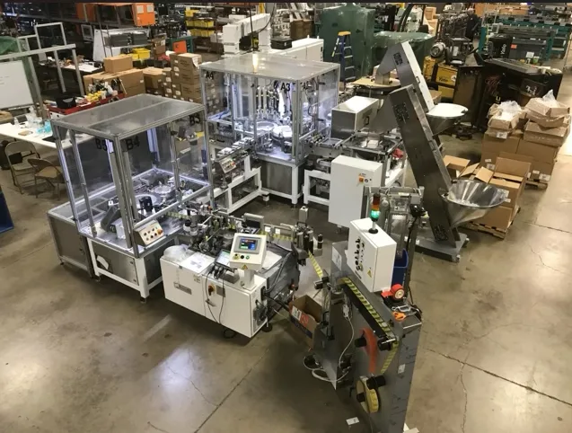 Continuous-motion labeling system running at two hundred parts per minute